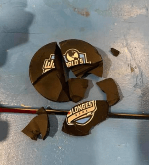 A hockey puck shattered by use in -30 to -50C weather, photo courtesy of Andrew Buchanan, goalie at World’s Longest Hockey Game near Sherwood Park