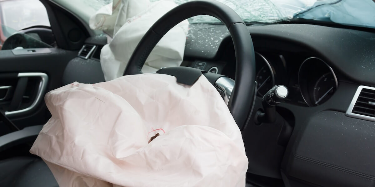 Deployed airbag after car crash. The importance of vehicle data in understanding motor vehicle accidents.