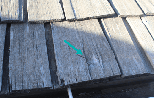 Figure 7_Hail damaged wood shakes Hail damaged wood shakes